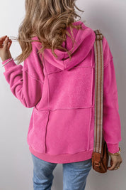 Hot pink oversized Sherpa patchwork hoodie with drawstring hood and pocket