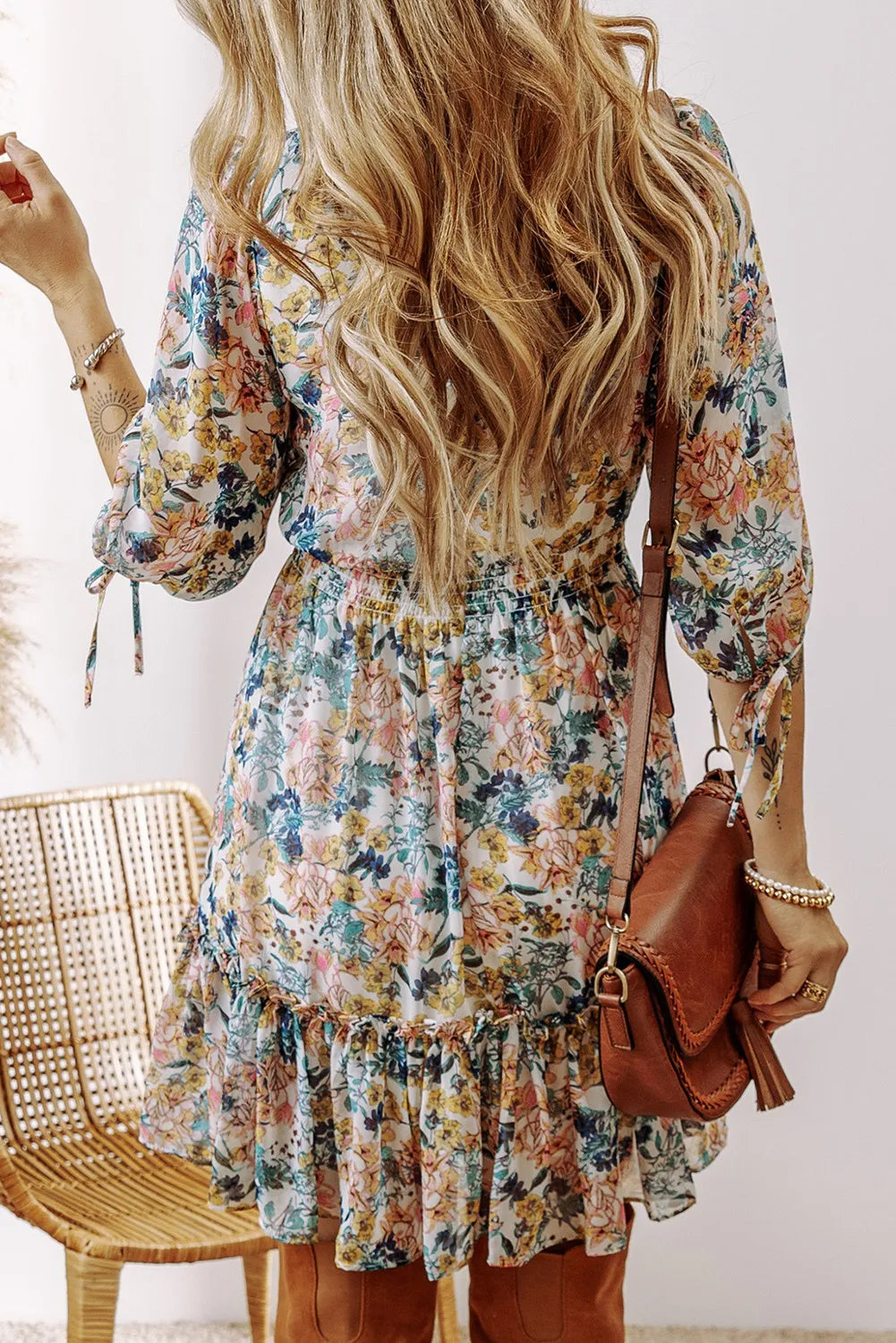 Floral printed V-neck half sleeve mini dress with ruffles