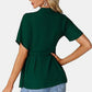 Dark green peplum top with tied round neck and flutter sleeves