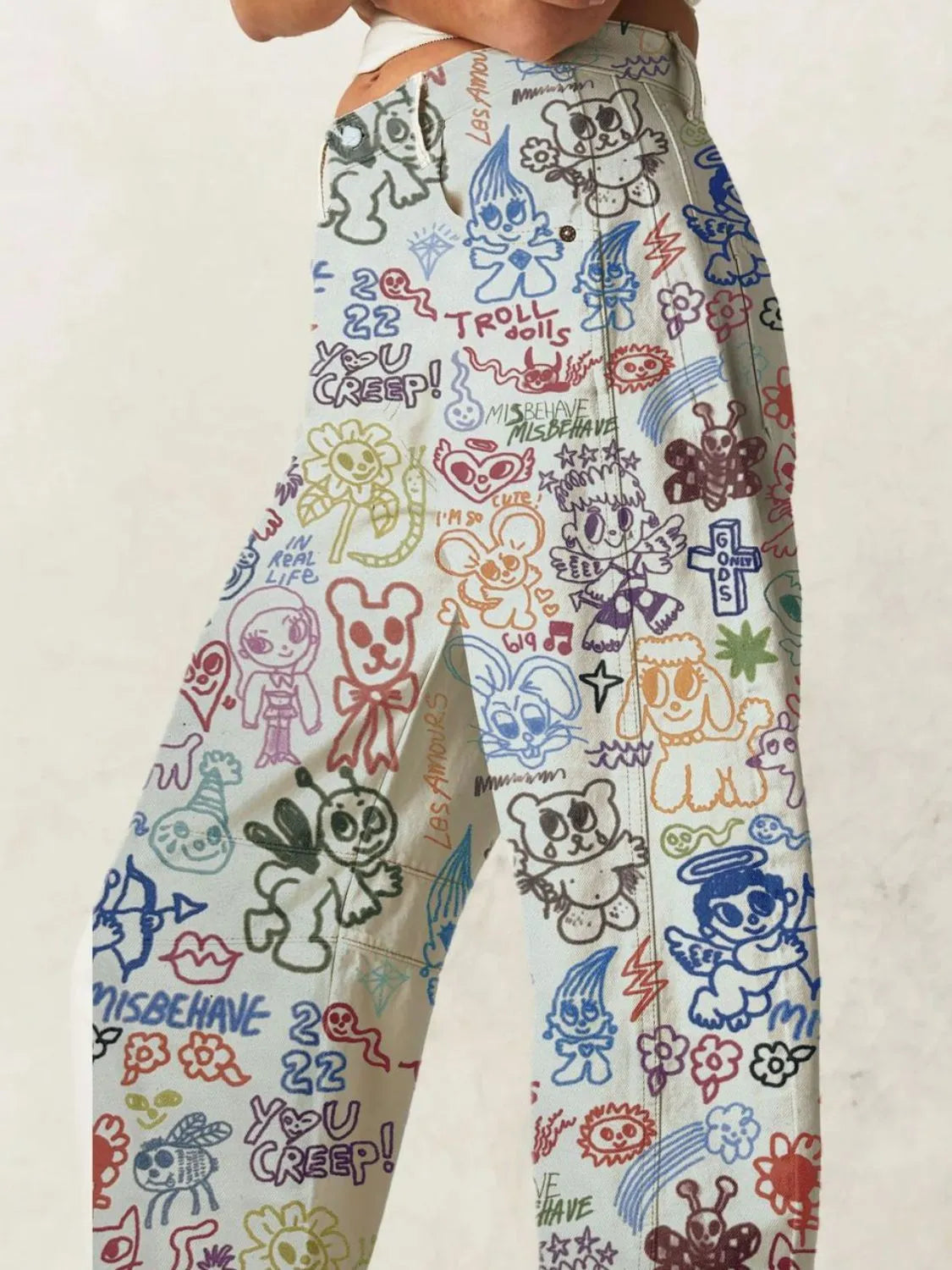 Cream printed wide-leg jeans with colorful graffiti cartoon pattern
