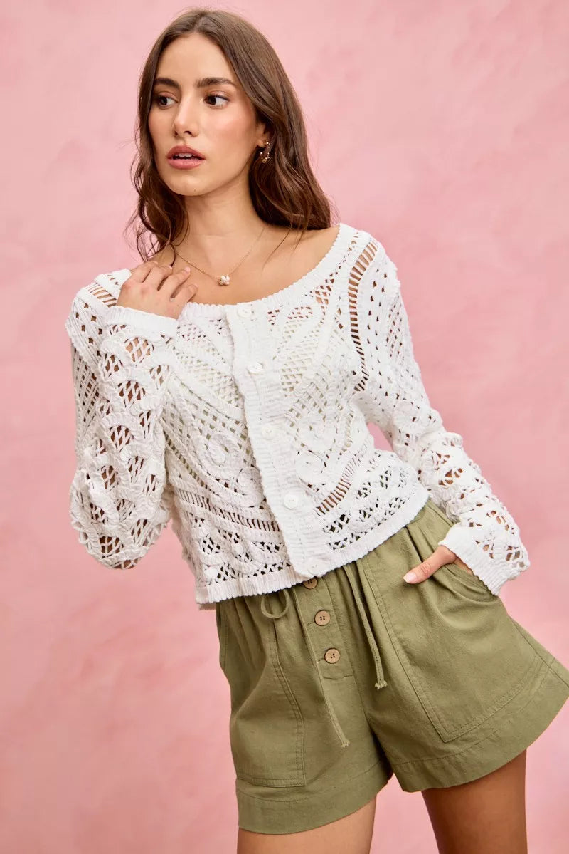 White crochet cardigan with buttons on SO ME twill shorts