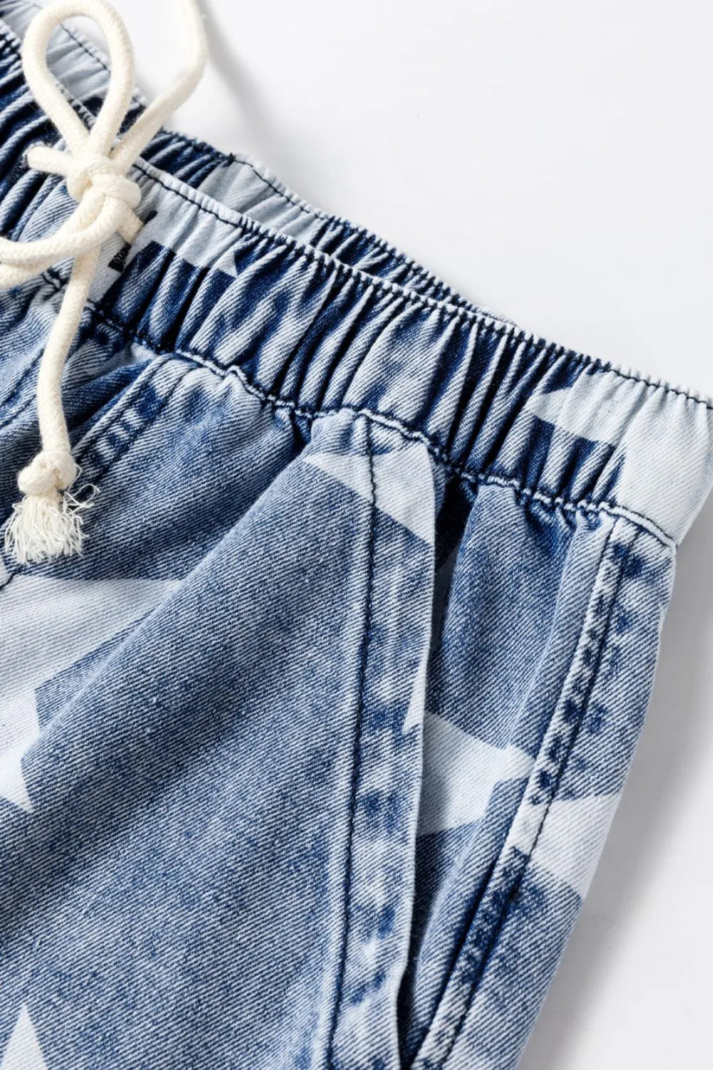 Blue and white geometric denim shorts with drawstring high waist