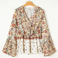 Yellow printed floral bell sleeve V-neck peplum blouse with polka dots