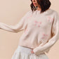 SO ME cream knit sweater with pink embroidered bows