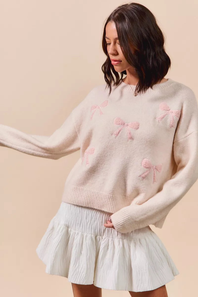 SO ME cream knit sweater with pink embroidered bows
