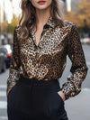 Shimmering gold black leopard print satin button-up blouse