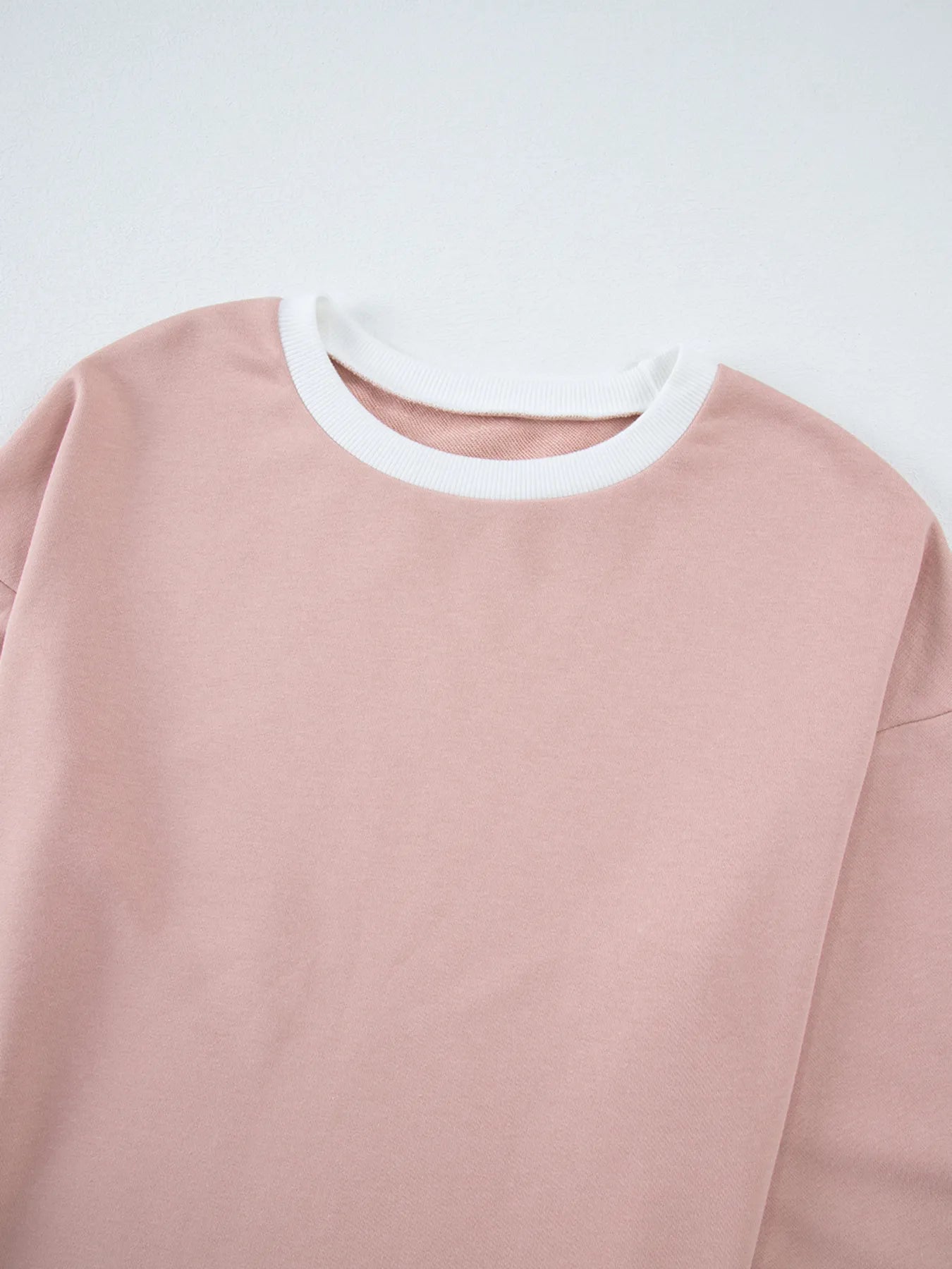 Daverri Fashions pink sweatshirt with white contrast trim collar and cuffs