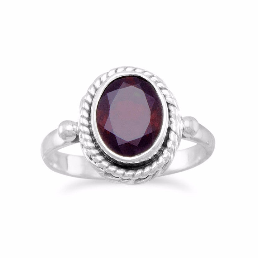 Faceted Garnet Ring with Rope Edge Rings