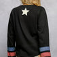POL Double Gauze V-Neck Long Sleeve T-Shirt with white star patch and striped cuffs