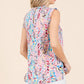 Lime 'N' Chili Full Size Graphic Print Ruffle Trim Mock Neck Sleeveless Top Plus Size