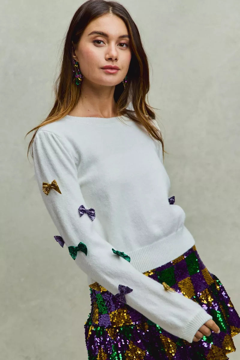 White SO ME Mardi Gras glitter bow knit sweater with colorful sequins