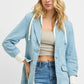 RISEN light blue denim blazer with white drawstring hood and cuffs