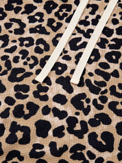Leopard print long sleeve hoodie with white stripes, black spots, and pocket