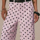 Daverri Polka Dot Wide Leg Jeans in pink polka-dot with black belt