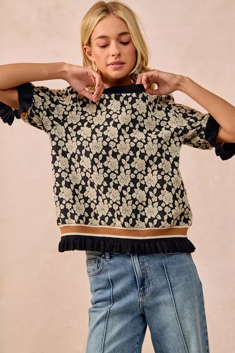 BiBi Textured Rose Knit Top in black and cream floral print with ruffled sleeves