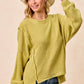 Cozy olive-green BiBi Boucle rib knit sweater with uneven hem