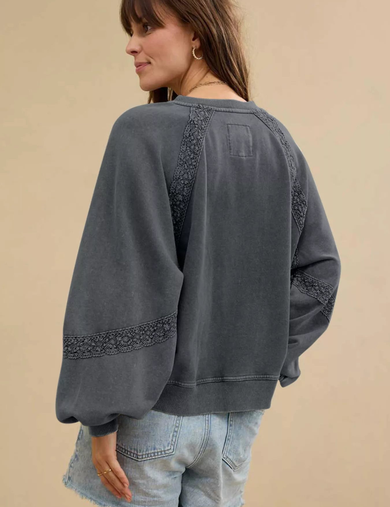 Charcoal gray mineral wash sweatshirt with lace patchwork details
