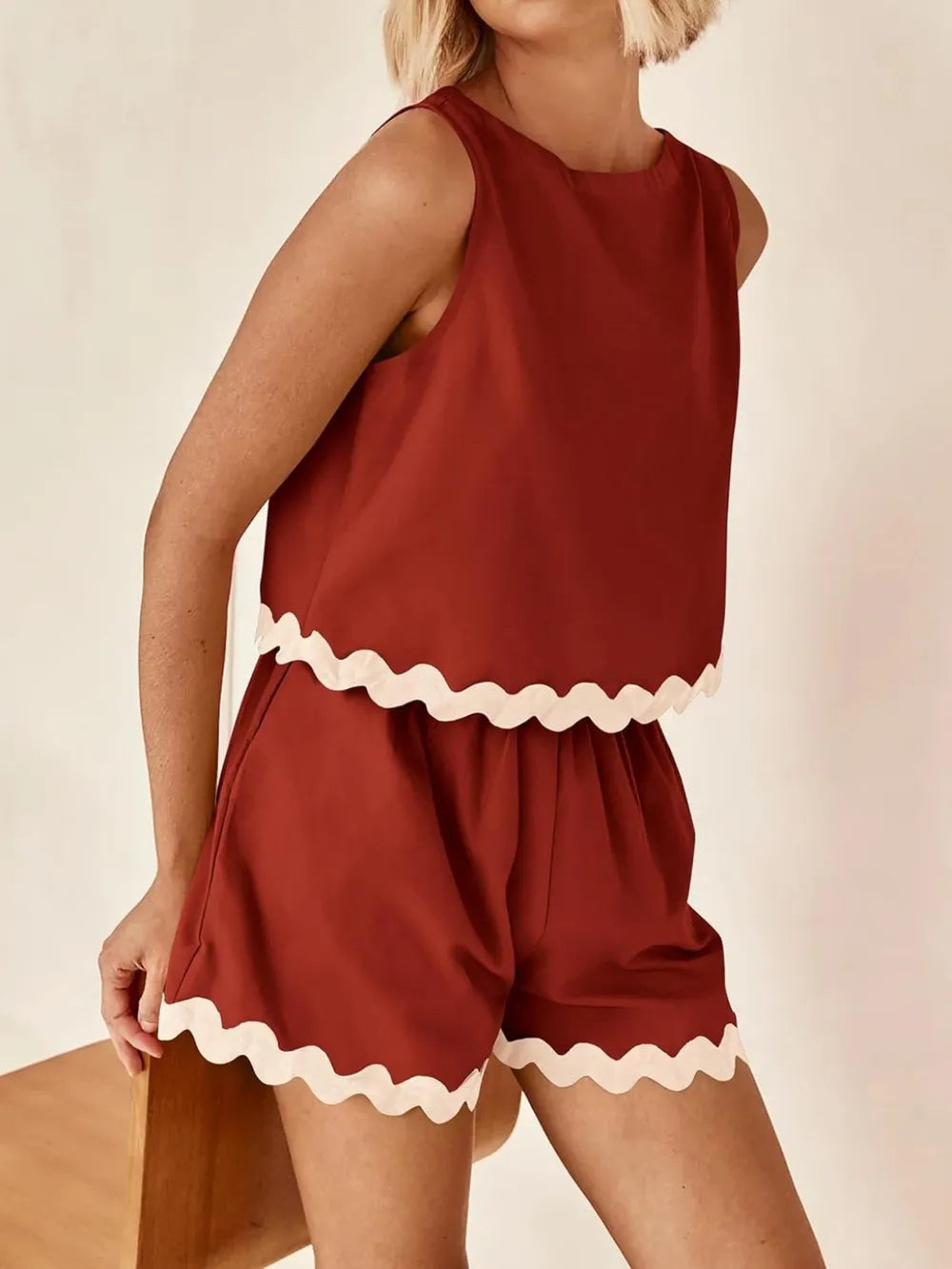 Daverri Fashions women’s rust sleeveless top and shorts set with cream trim