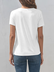 White short-sleeved crew neck t-shirt with letter graphic