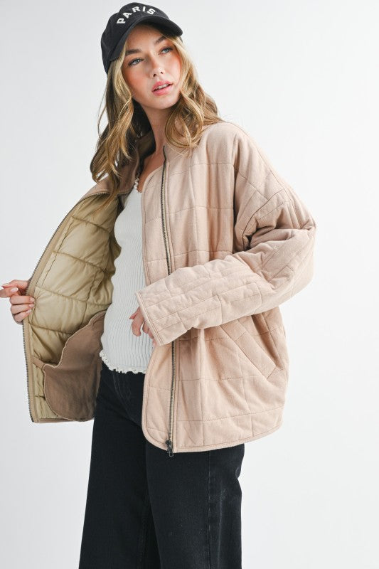 Beige quilted Dixie Jacket with tan interior lining