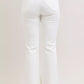 White Judy Blue high-waisted flared jeans with brown leather patch