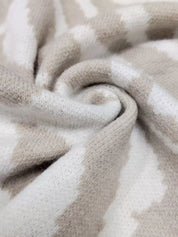 Cozy beige camo fleece blanket in Zebra Print Button Up Cardigan