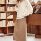 Beige exposed seam textured knit V-neck pullover sweater