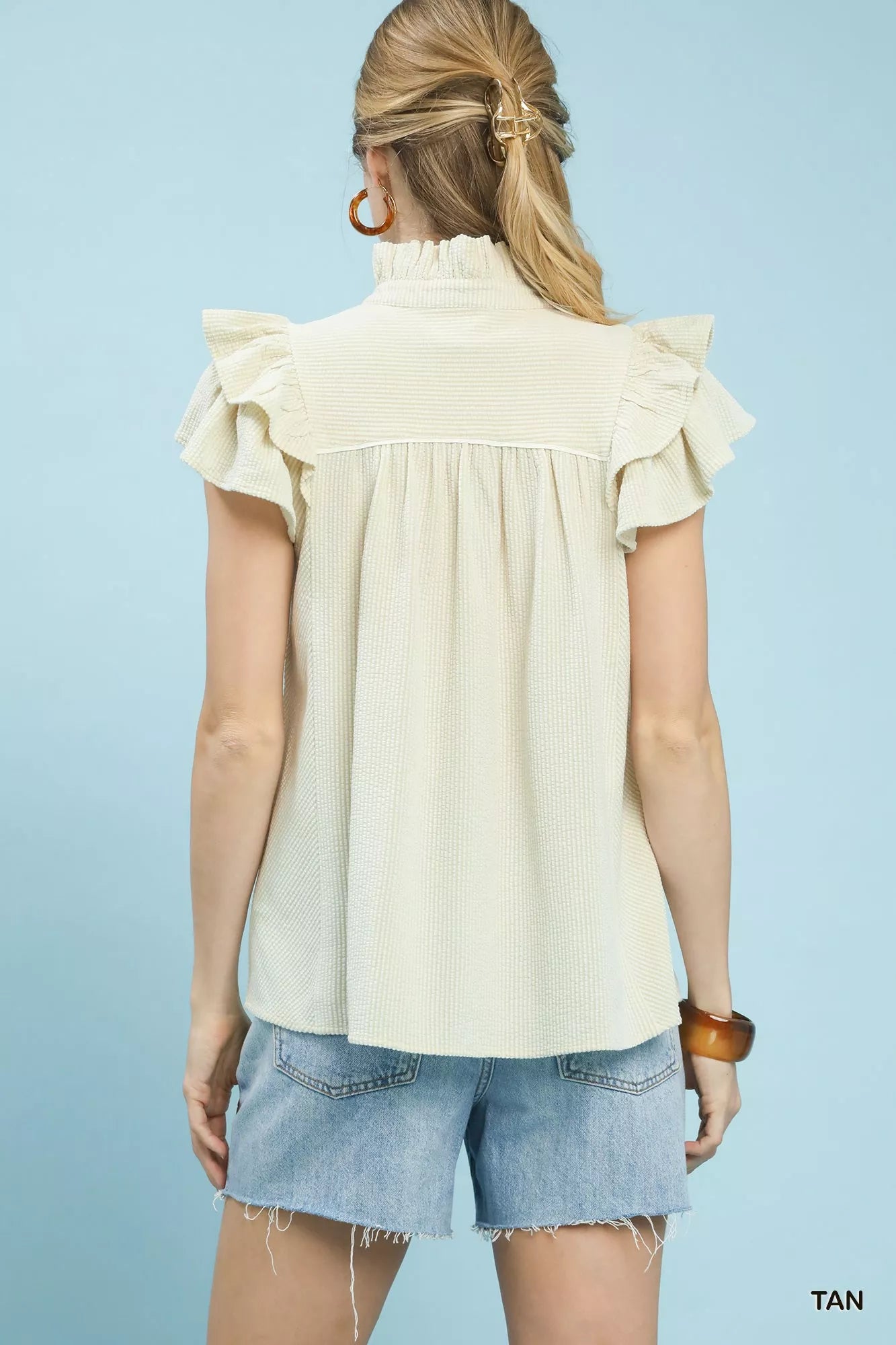 Umgee ruffled sleeve textured blouse in cream ribbed fabric