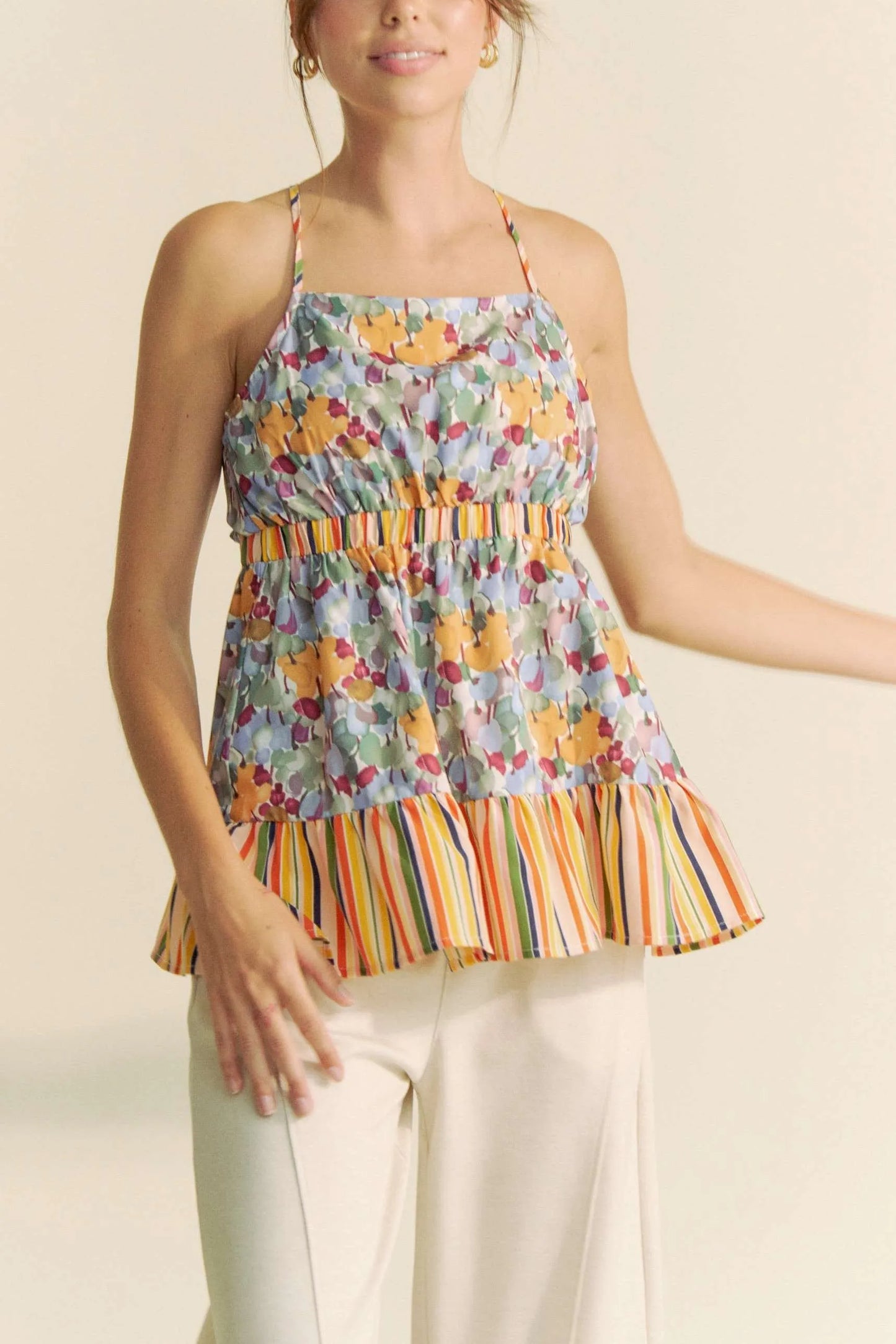 Davi & Dani floral smocked sleeveless ruffle halter top with striped hem