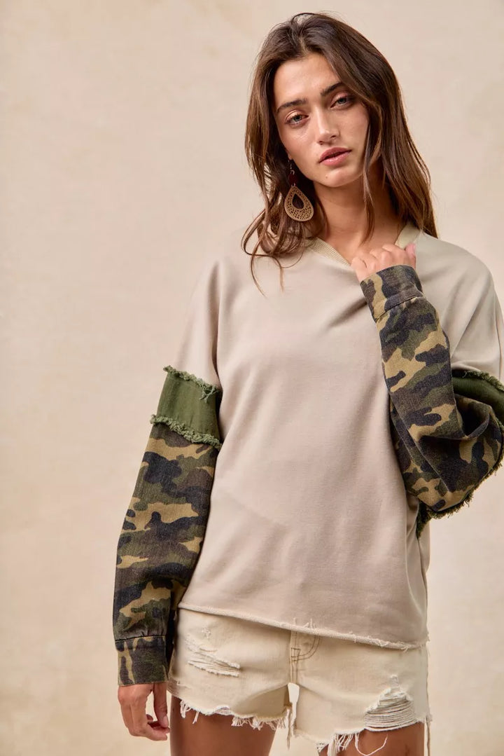 BiBi Camo Sleeve French Terry Top with Frayed Edge | Daverri Fashions