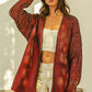 Cozy BiBi metallic knit V-neck cardigan in red black tie-dye