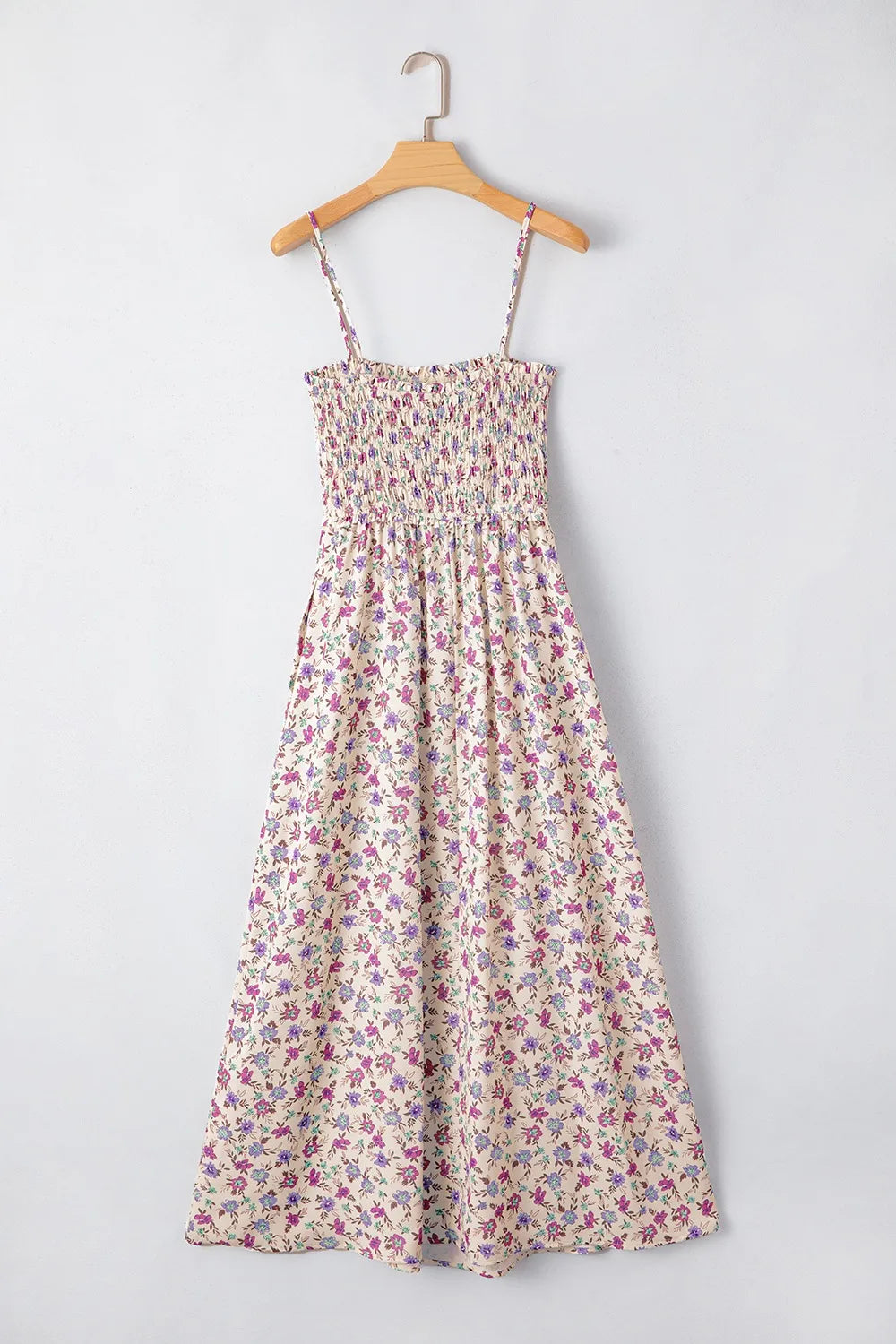 Off-white bohemian ditsy floral smocked fit flare sundress on hanger