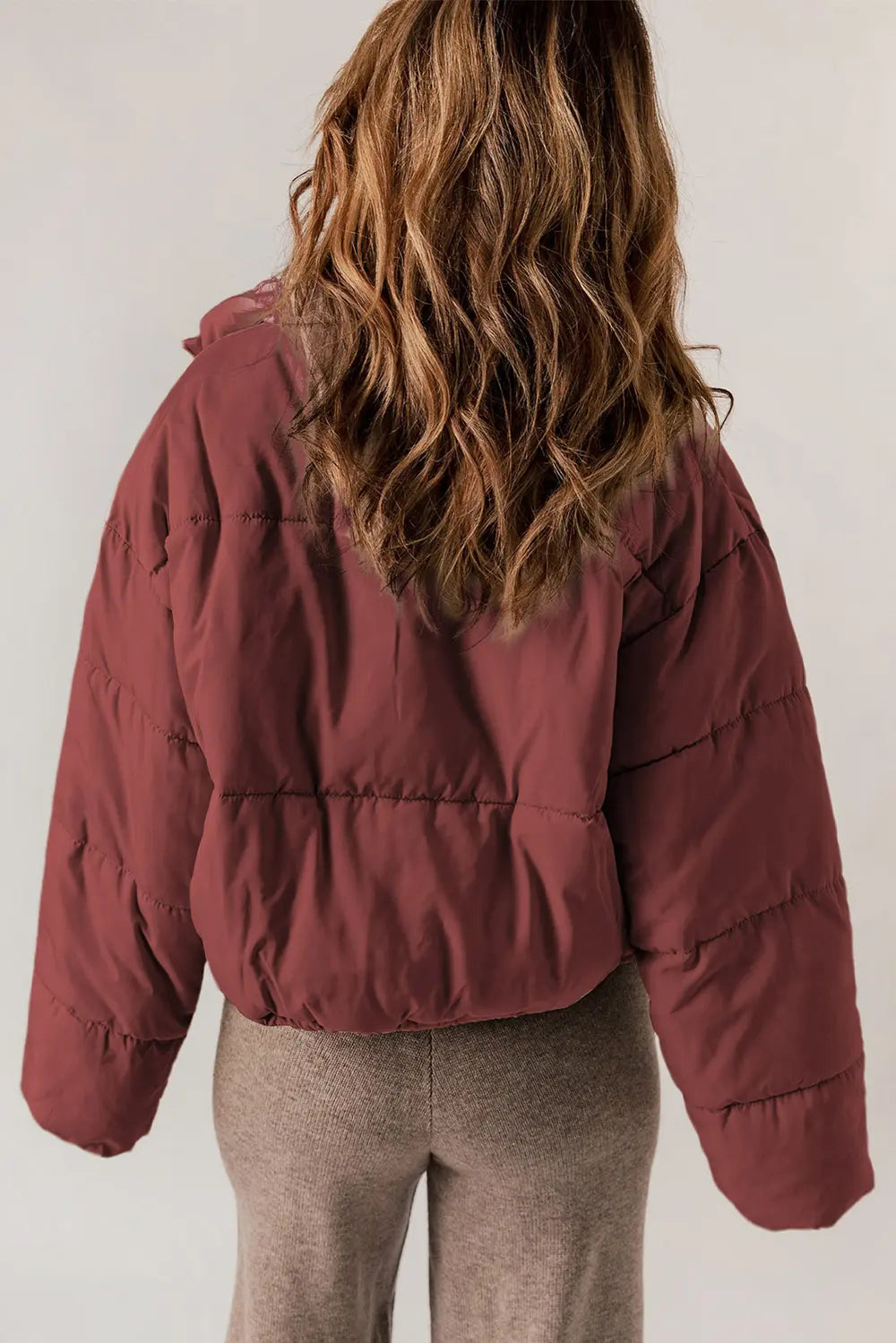 Maroon zip-up collared puffer jacket with quilted long sleeves