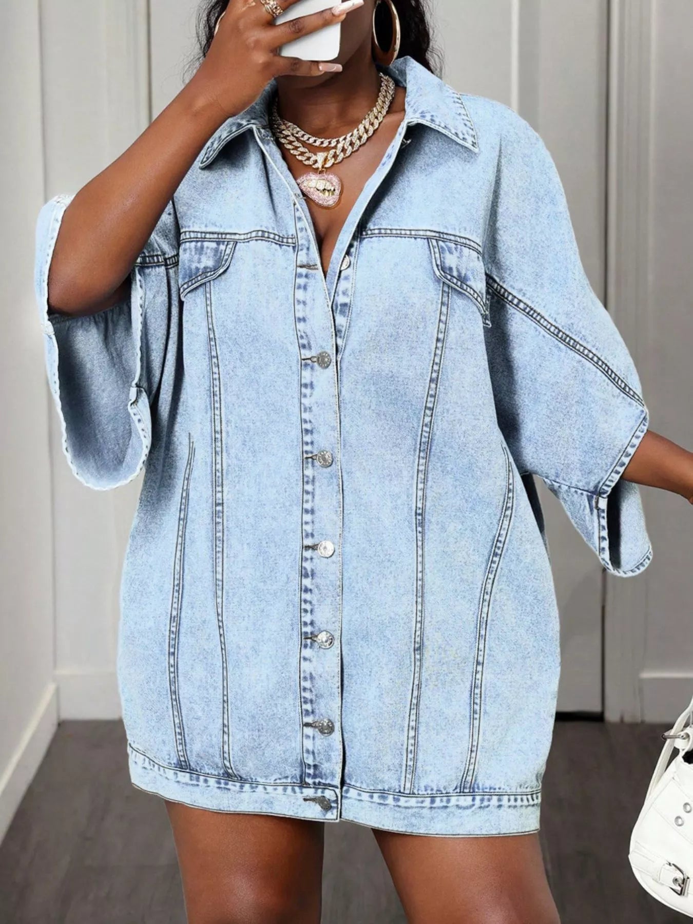 Light-wash oversized batwing sleeve denim shirt dress with button front