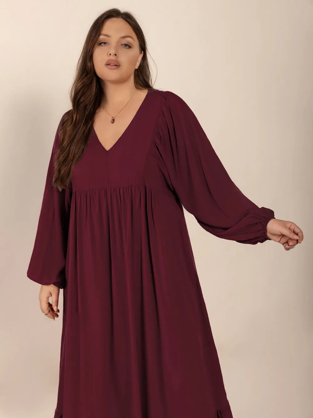 Plus Size Ruffled Hem V-Neck Balloon Sleeve Dress | Daverri Fashions