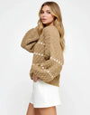 Cozy camel cable-knit sweater with cream diamond pattern and puff sleeves