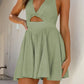 Daverri light green cutout halter neck mini dress with deep V-neck