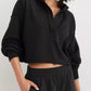 Black Exposed Seam Dropped Shoulder Hoodie with oversized fit and ribbed cuffs
