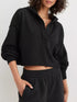 Black Exposed Seam Dropped Shoulder Hoodie with oversized fit and ribbed cuffs