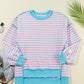 Pastel pink and light blue high-low striped long sleeve sweatshirt with turquoise trim