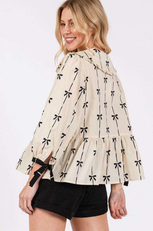 SAGE + FIG Bow Print Tie Front Babydoll Blouse - DAVERRI FASHIONS