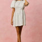White textured SO ME floral jacquard mini dress with puffed sleeves and gathered waist