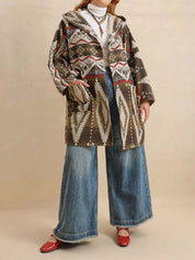 Plus size Aztec print hooded open front cardigan with wide-leg jeans and red shoes