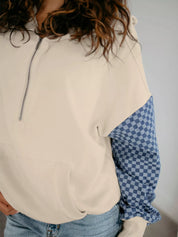Cream and blue checkered half-zip long sleeve sweatshirt