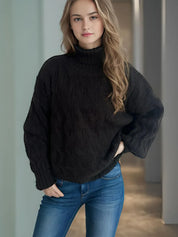 Black cable-knit turtleneck sweater with balloon sleeves