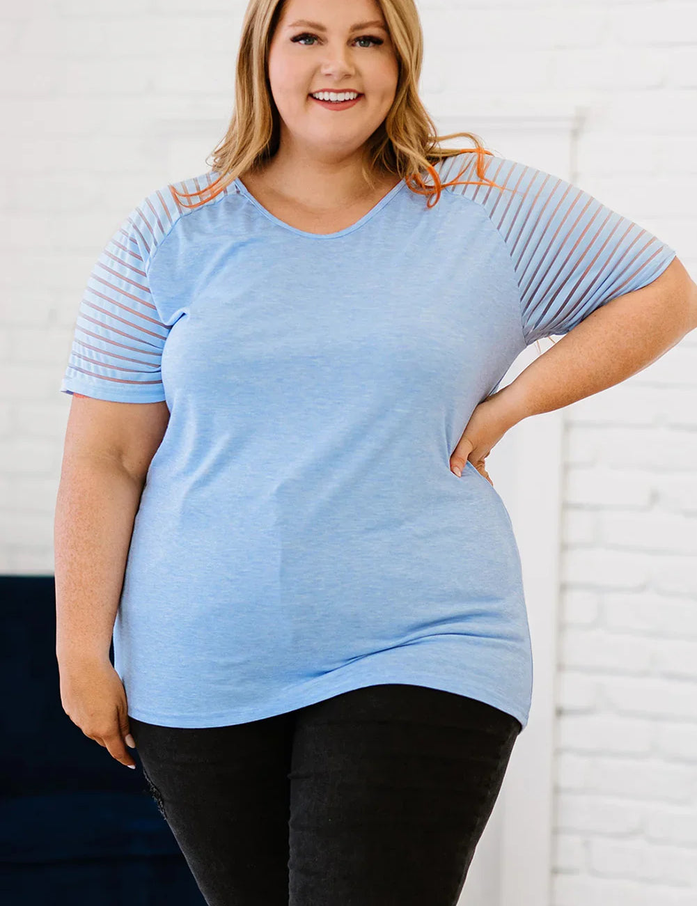 Plus size light blue striped V-neck raglan tee with black leggings