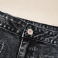 High-waisted wide leg washed black denim jeans with metallic lans button