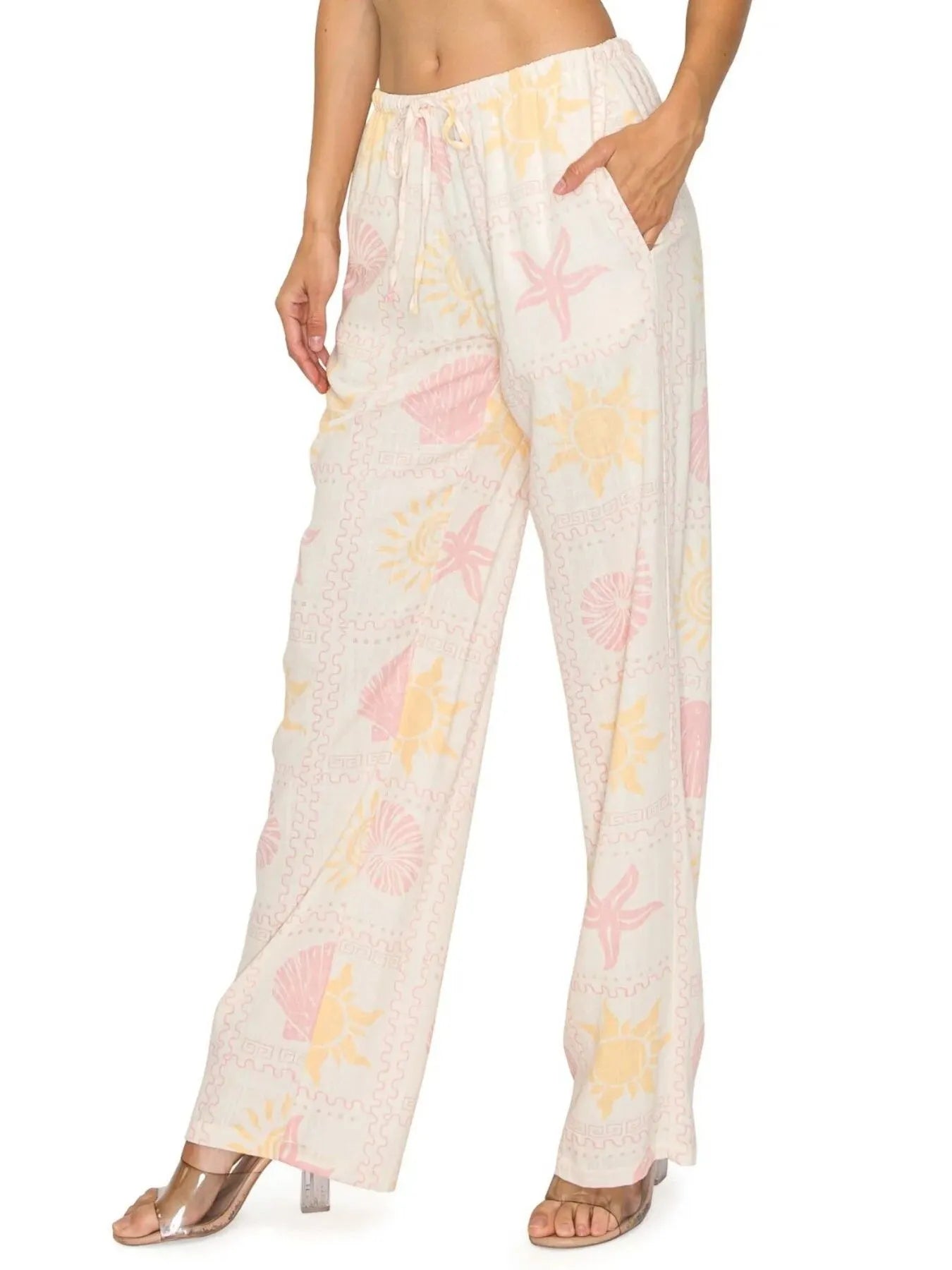 Beige printed drawstring straight pants with pastel starfish and seashell pattern