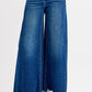 RISEN high-rise wide-leg jeans in medium blue wash with frayed hems
