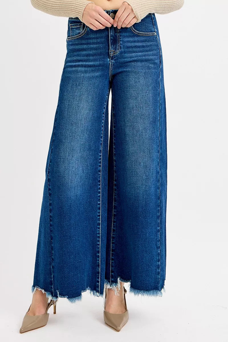 RISEN high-rise wide-leg jeans in medium blue wash with frayed hems